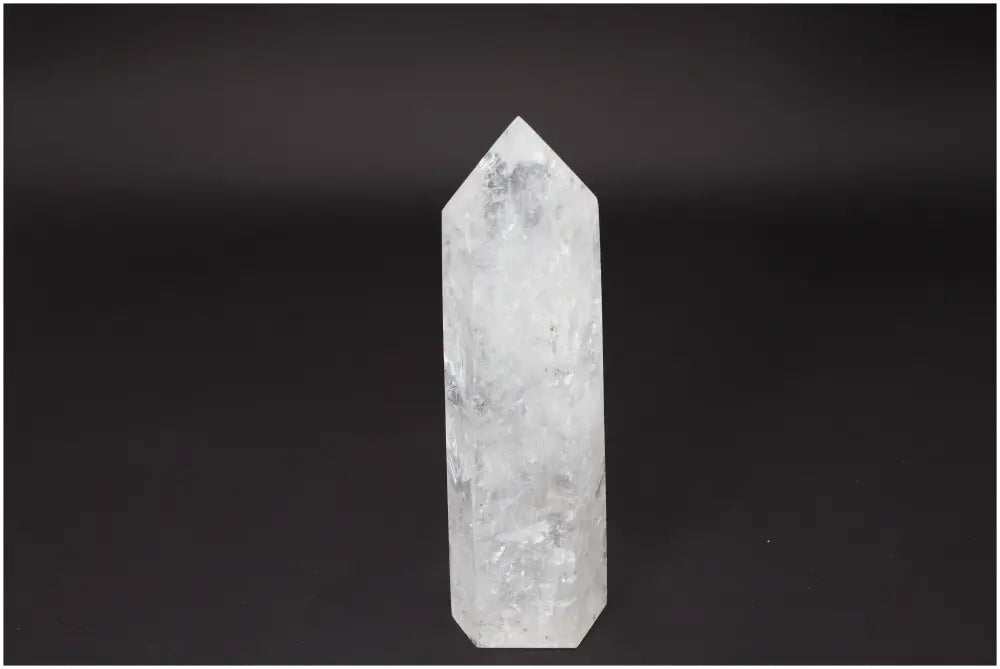 Lemurian Quartz Obelisk for clarity and growth, ethically sourced and naturally formed "Master Healer" crystal on a black background.
