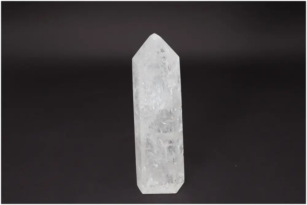 Lemurian Quartz Obelisk for healing and clarity on a black background