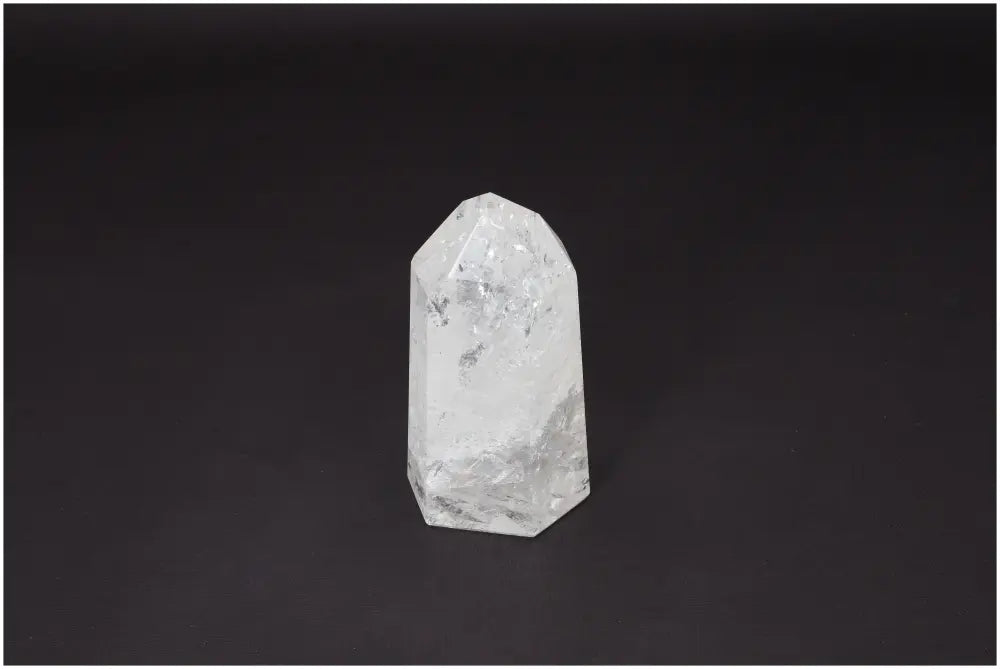 Lemurian Quartz Obelisk, Clear Quartz crystal, Master Healer, amplifying energy, ethically sourced, personal growth, dark background