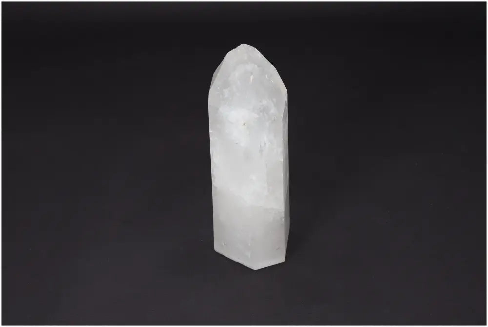 Lemurian Quartz Obelisk crystal on dark background, symbolizing clarity and personal growth.