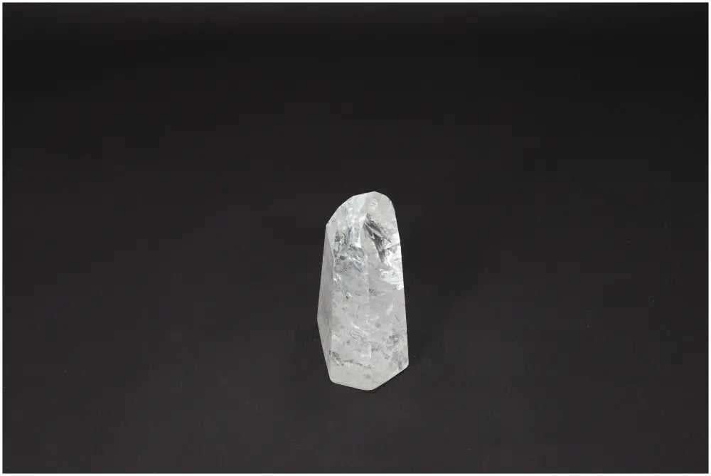 Lemurian Quartz Obelisk on black background showcasing clear, naturally formed structure for clarity and balance.