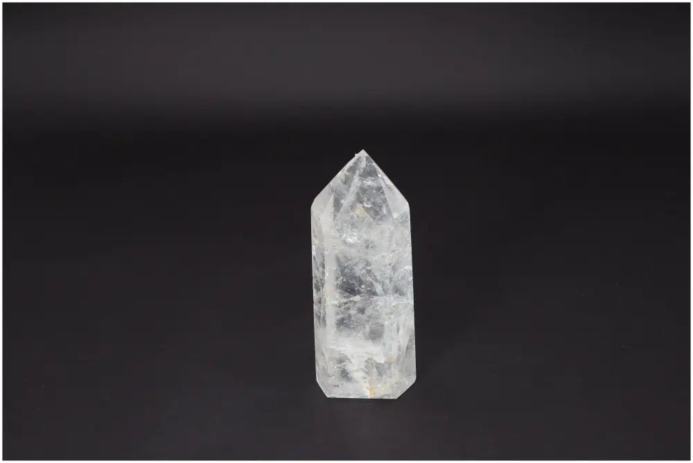 Lemurian Quartz Obelisk on black background, a powerful Clear Quartz crystal for clarity, balance, and personal growth.