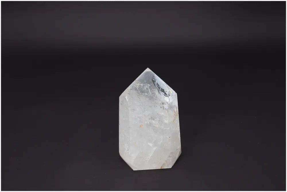 Lemurian Quartz Obelisk on dark background, crystal for clarity, balance, personal growth, Master Healer energy amplifier.