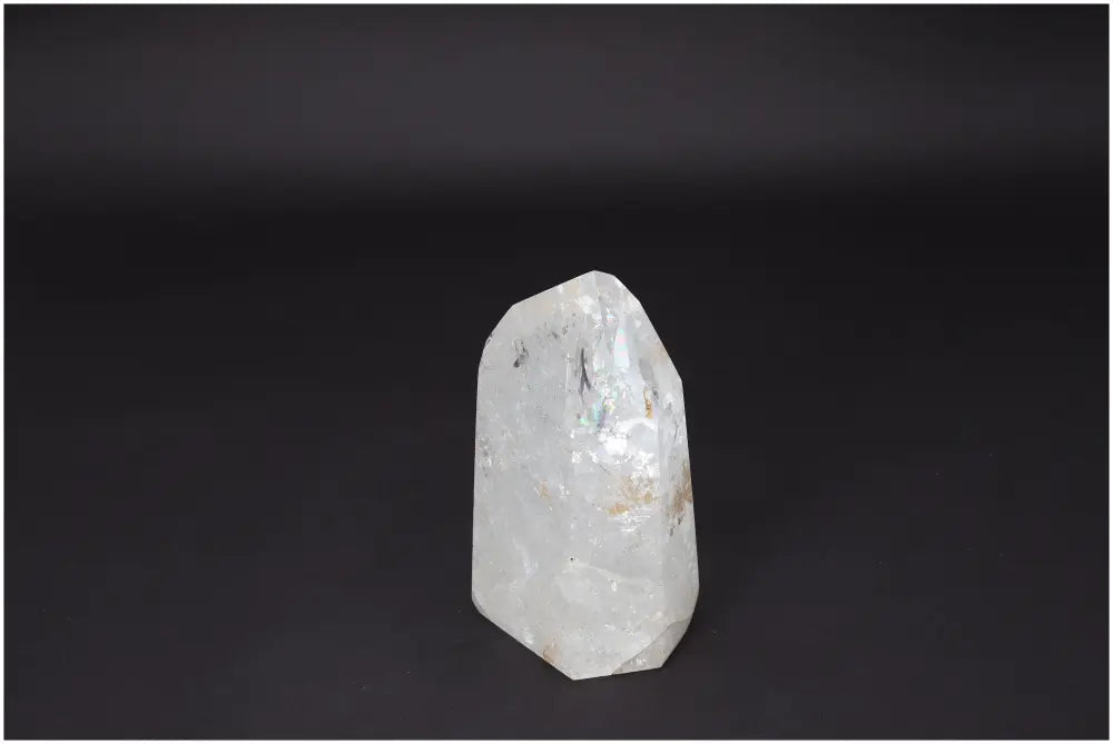 Lemurian Quartz Obelisk on black background, showcasing natural clarity and healing energy for balance and personal growth.