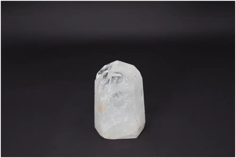 Lemurian Quartz Obelisk crystal for clarity, balance, and healing, displayed against a black background.