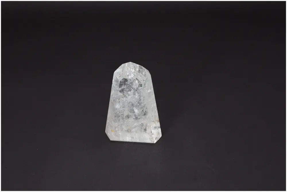 Lemurian Quartz Obelisk against black background, enhances clarity and balance, ethically sourced, master healer crystal.