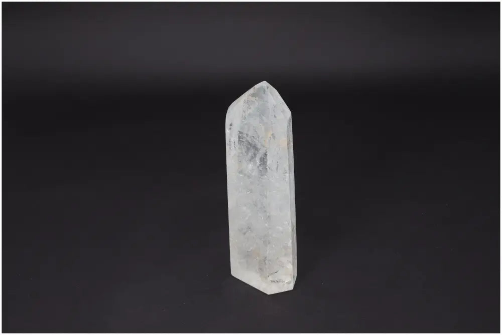 Lemurian Quartz Obelisk, ethically sourced clear crystal for clarity and balance in energy healing practices.