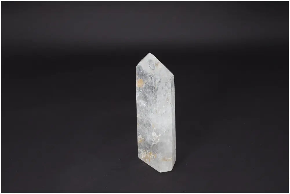 Lemurian Quartz Obelisk crystal on dark background, known as a Master Healer for clarity, balance, and personal growth.