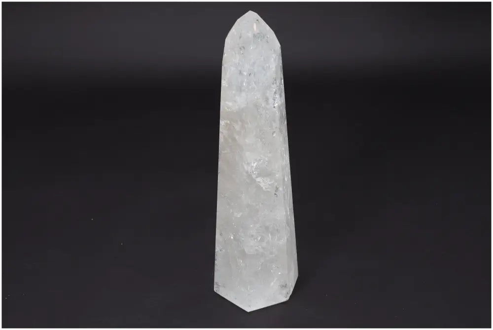 Lemurian Quartz Obelisk against a dark background, known as "Master Healer," enhances clarity, balance, and personal growth.