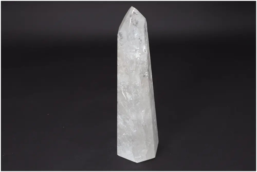 Lemurian Quartz Obelisk enhancing energy and clarity, known as a "Master Healer" crystal, hand-selected and ethically sourced.