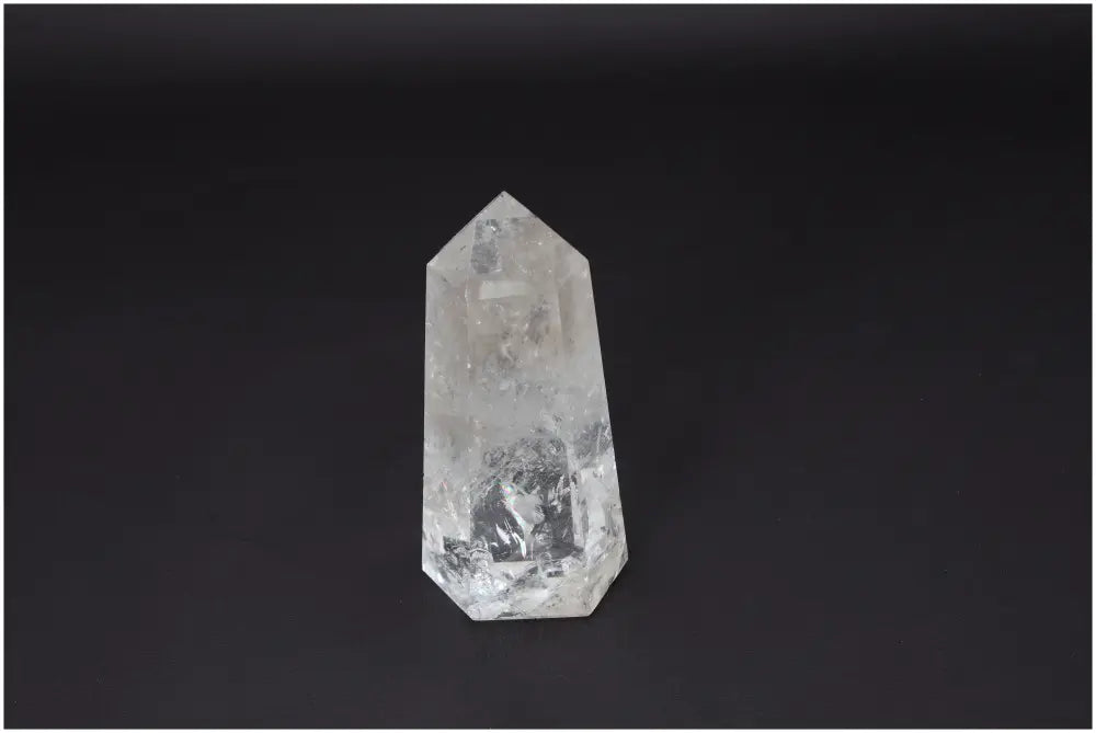 Lemurian Quartz Obelisk for clarity and balance, ethically sourced crystal known as the Master Healer, on black background