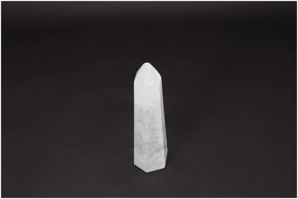 Lemurian Quartz Obelisk on black backdrop, symbolizing clarity, balance, and personal growth, perfect for energy amplification.