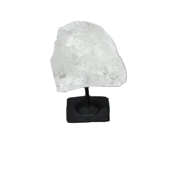 Lemurian Quartz on metal stand, showcasing a clear crystal known for clarity, balance, and personal growth in a minimalist setting.