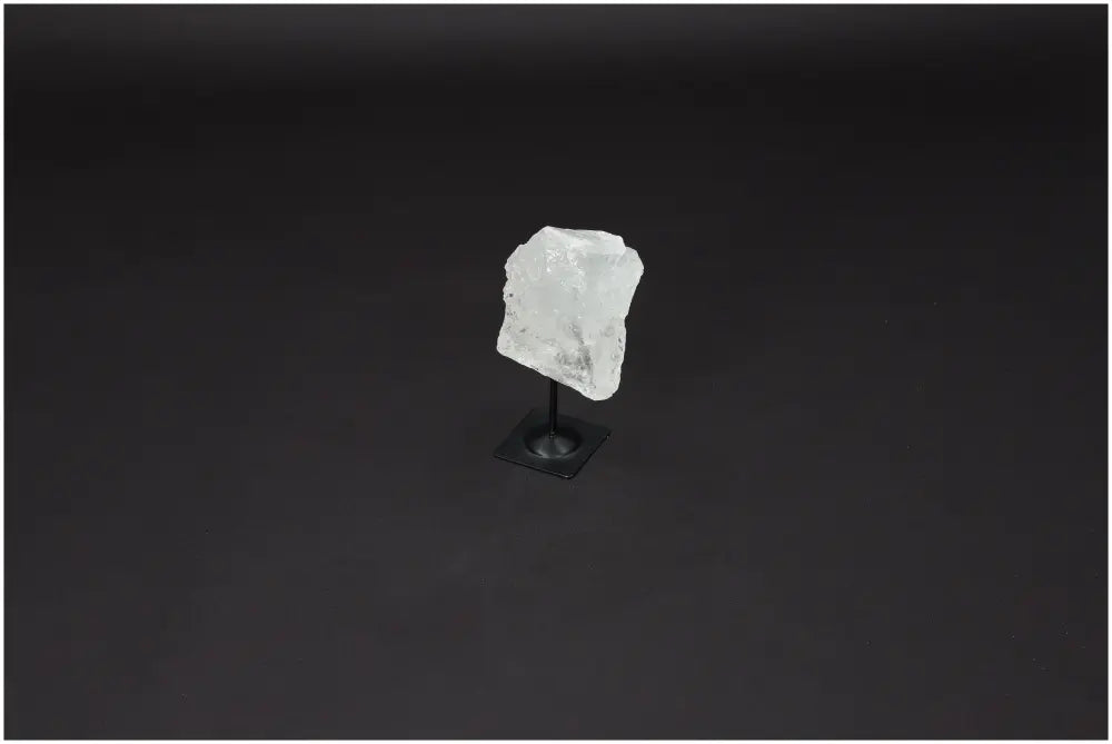 Lemurian Quartz on metal stand, a hand-selected clear crystal for clarity and balance, ethically sourced and naturally formed.