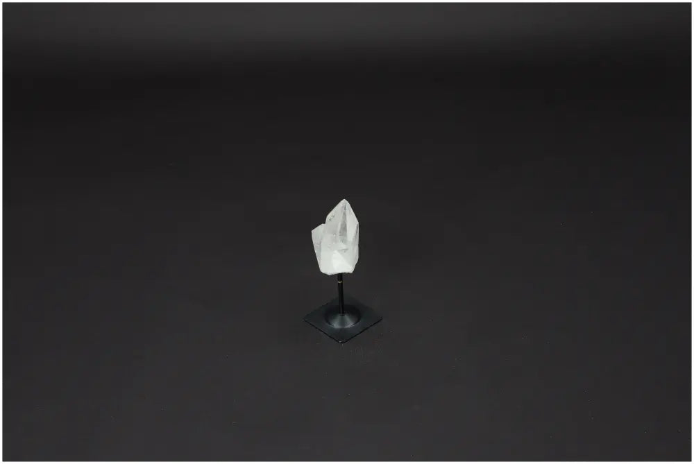 Lemurian Quartz Crystal on a Metal Stand, known as a Master Healer for enhancing clarity, balance, and personal growth.