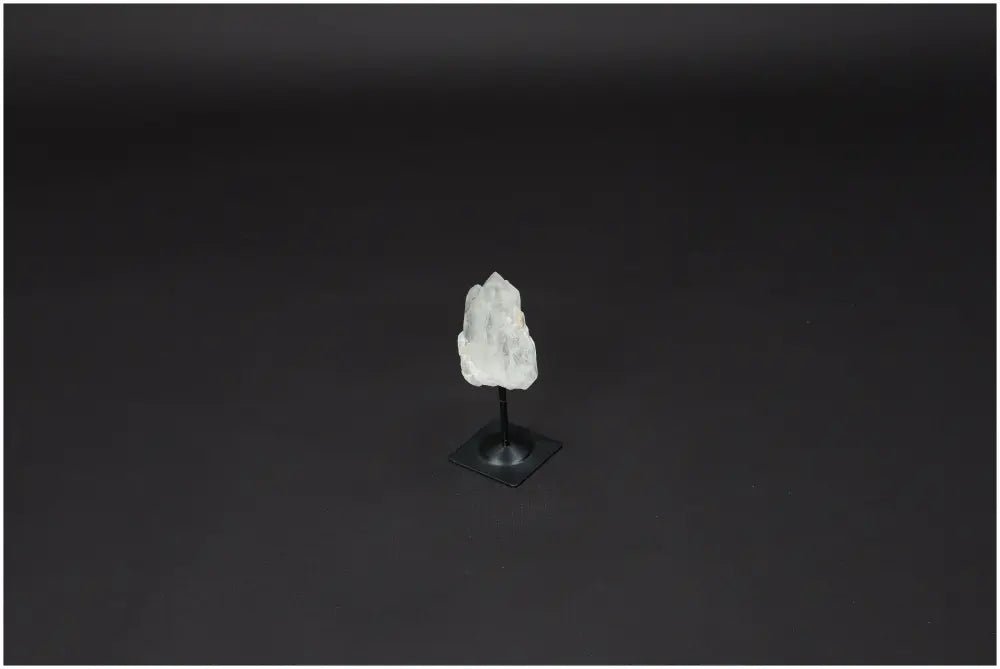 Lemurian Quartz crystal on metal stand, ideal for energy amplification and balance, hand-selected and ethically sourced.