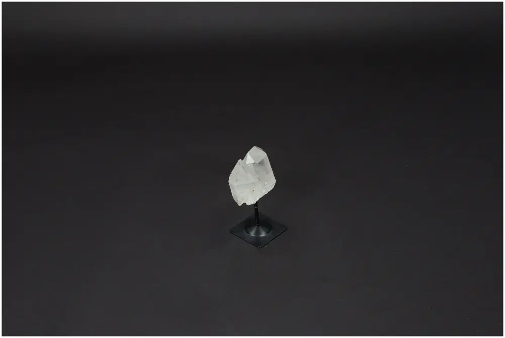 Lemurian Quartz crystal on metal stand, known as Master Healer, for energy amplification, clarity, balance, ethical sourcing.