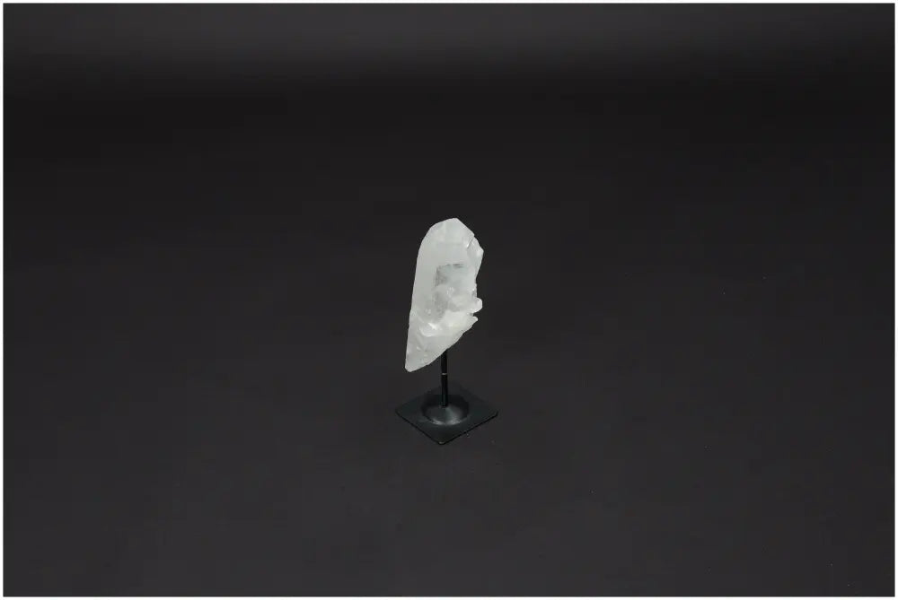 Lemurian Quartz on metal stand, showcasing its natural beauty and healing properties, ideal for clarity and balance in energy work.