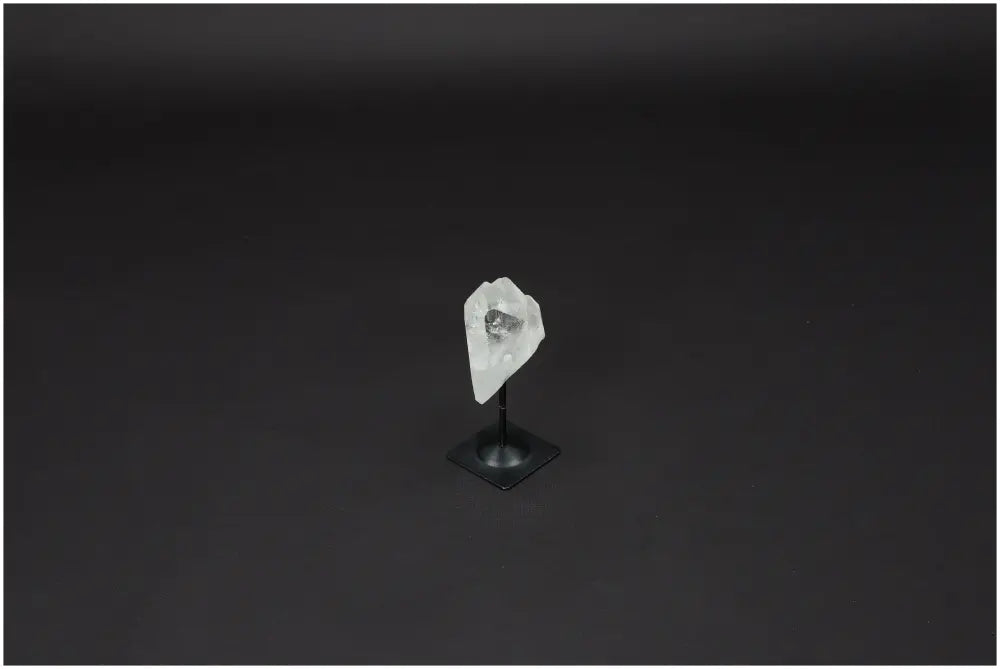 Lemurian Quartz crystal on metal stand, hand-selected for clarity and personal growth, known as "Master Healer" in crystal healing.