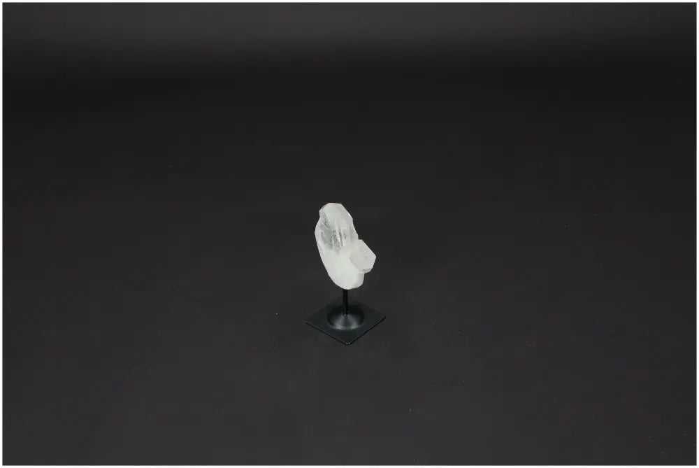 Lemurian Quartz on metal stand, offering powerful purification and harmonizing energy, ideal for neutralizing negative vibrations and radiation.