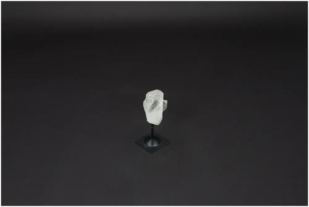 Lemurian Quartz on sleek metal stand, perfect for purification and harmonizing energy; ideal for everyday healing and space cleansing.