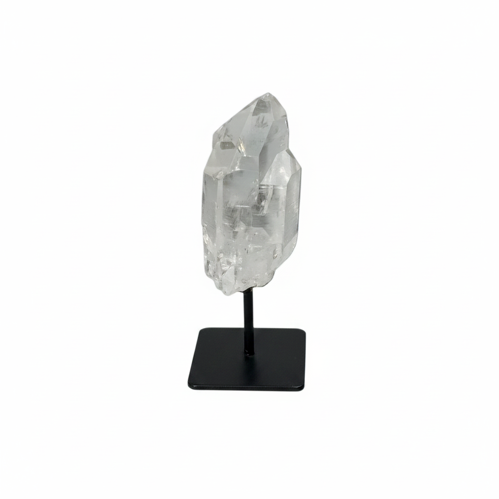 Lemurian Quartz on a metal stand, showcasing its clear, powerful purification properties against negative vibrations.