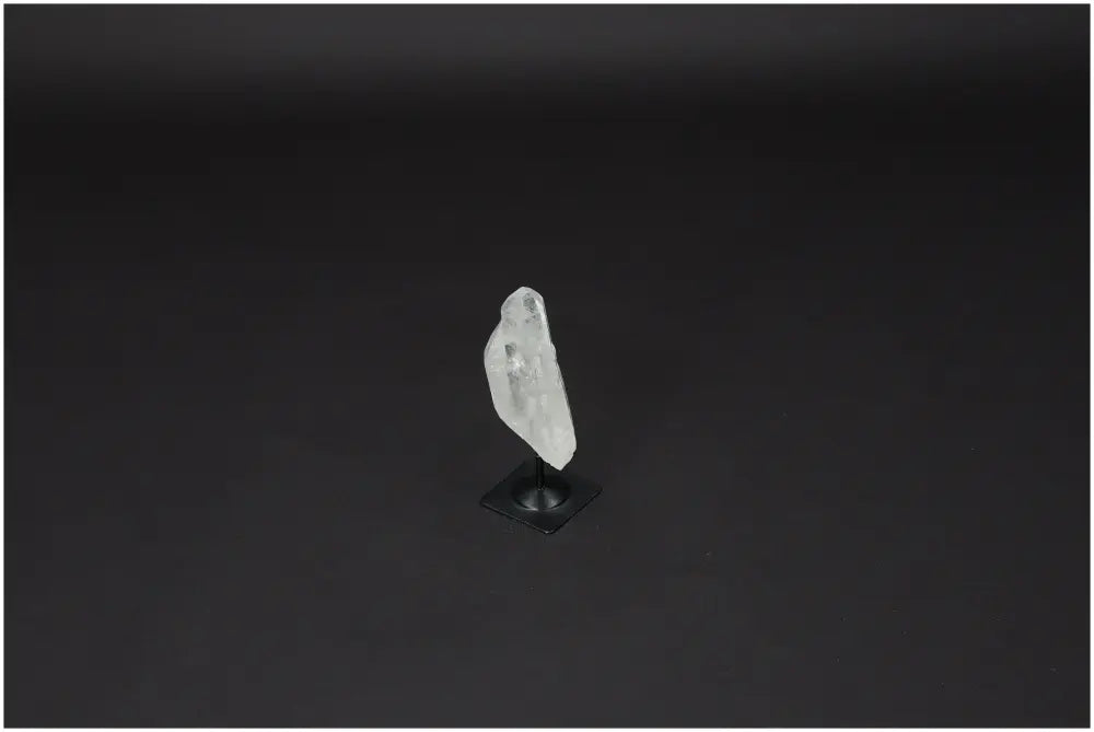 Lemurian Quartz crystal on a sleek metal stand for purification and energy harmony, absorbs negative vibrations and EM radiation.