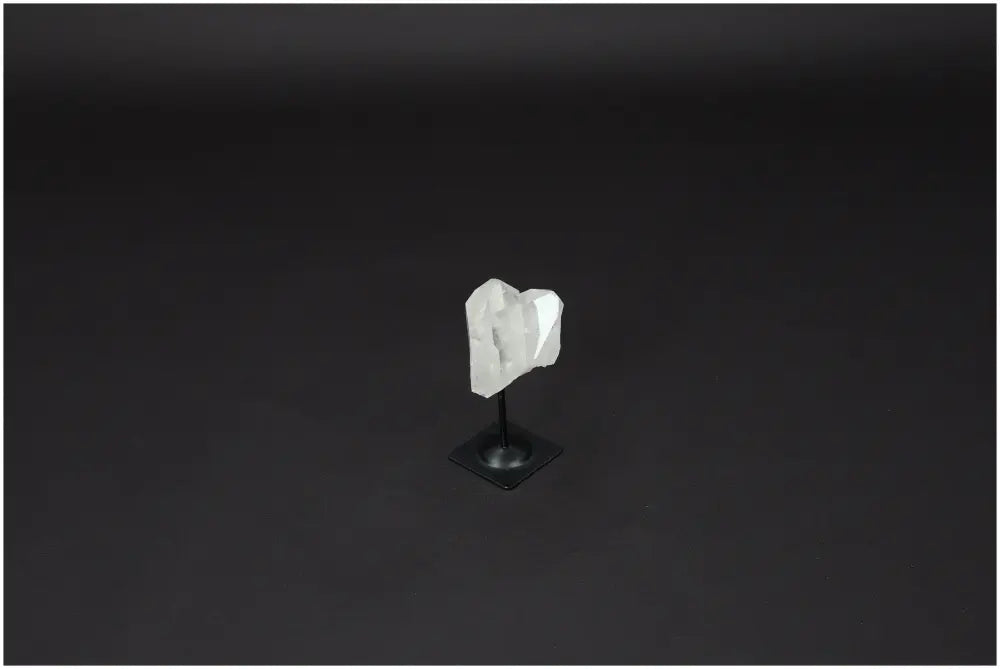 Lemurian Quartz on metal stand, a powerful Clear Quartz for purification, harmonizing body, mind, and energy, dispelling negative vibes.