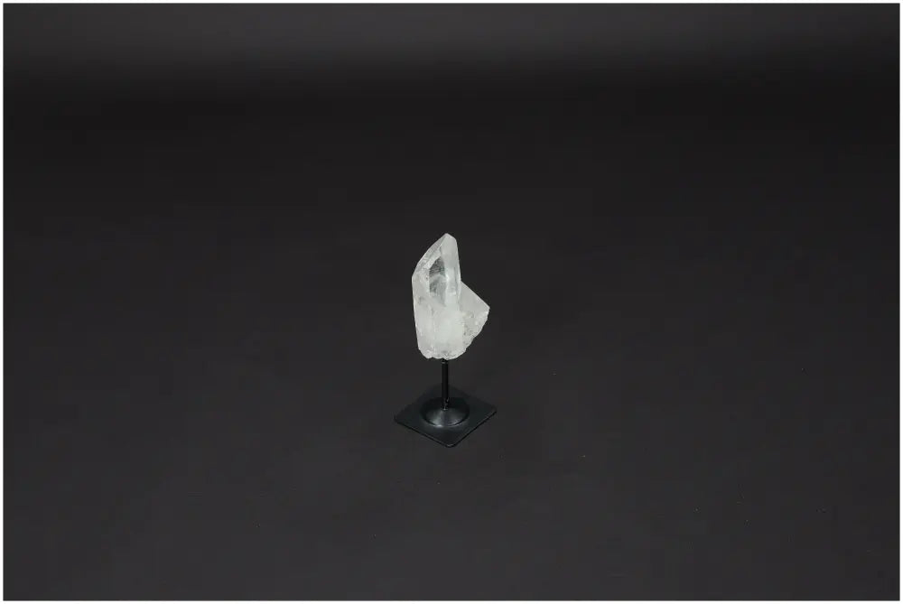 Lemurian Clear Quartz on metal stand, purifies and harmonizes energy, ideal for neutralizing negative vibrations and radiation.