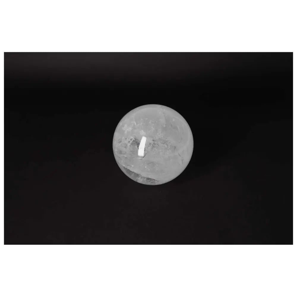 Lemurian Quartz Sphere 13 CM with radiant energy and soul connection against a dark background
