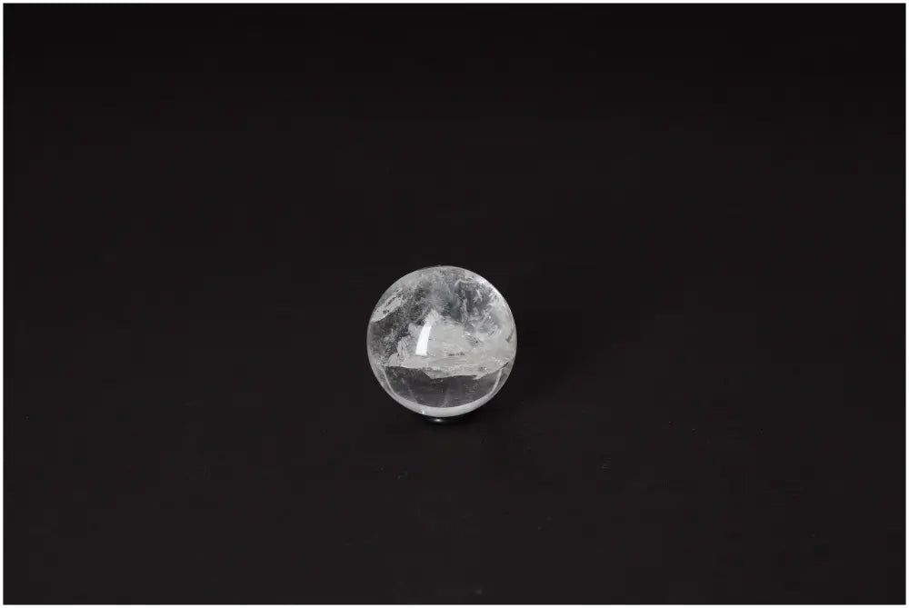 Lemurian Quartz Sphere 3-4 CM displaying radiant, high-vibrational energy with subtle striations, ideal for spiritual growth and soul connection.