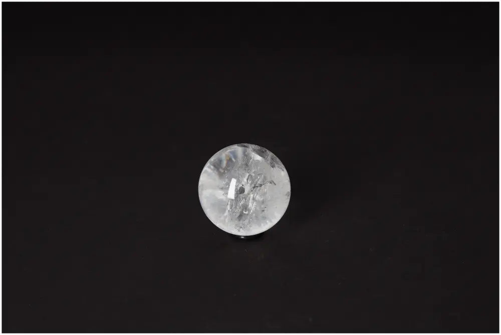 Lemurian Quartz sphere on dark background radiating clarity and high-vibrational energy, 4-5 cm