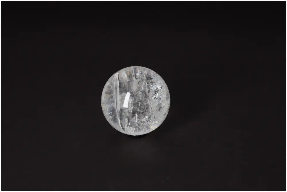 Lemurian Quartz Sphere 5-6 CM, radiant energy, ancient wisdom, spiritual growth enhancing crystal with luminous clarity and subtle striations.