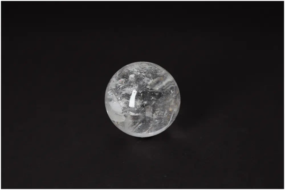 Lemurian Quartz Sphere 6-7 CM with radiant energy, subtle striations, and luminous clarity for spiritual growth and inner clarity.