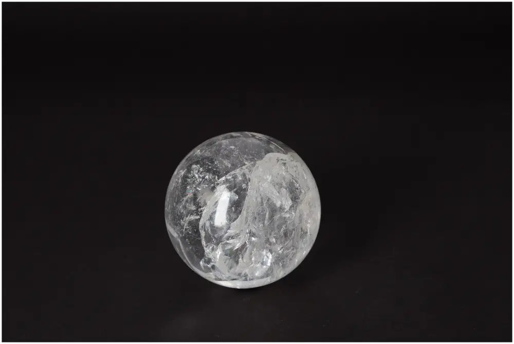 Lemurian Quartz Sphere 7-8 CM with luminous clarity, believed to carry ancient wisdom for spiritual growth and insight.