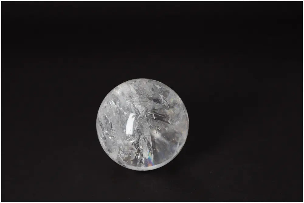 Lemurian Quartz Sphere 7-8 CM with luminous clarity and ancient striations, promoting spiritual growth and soul connection.