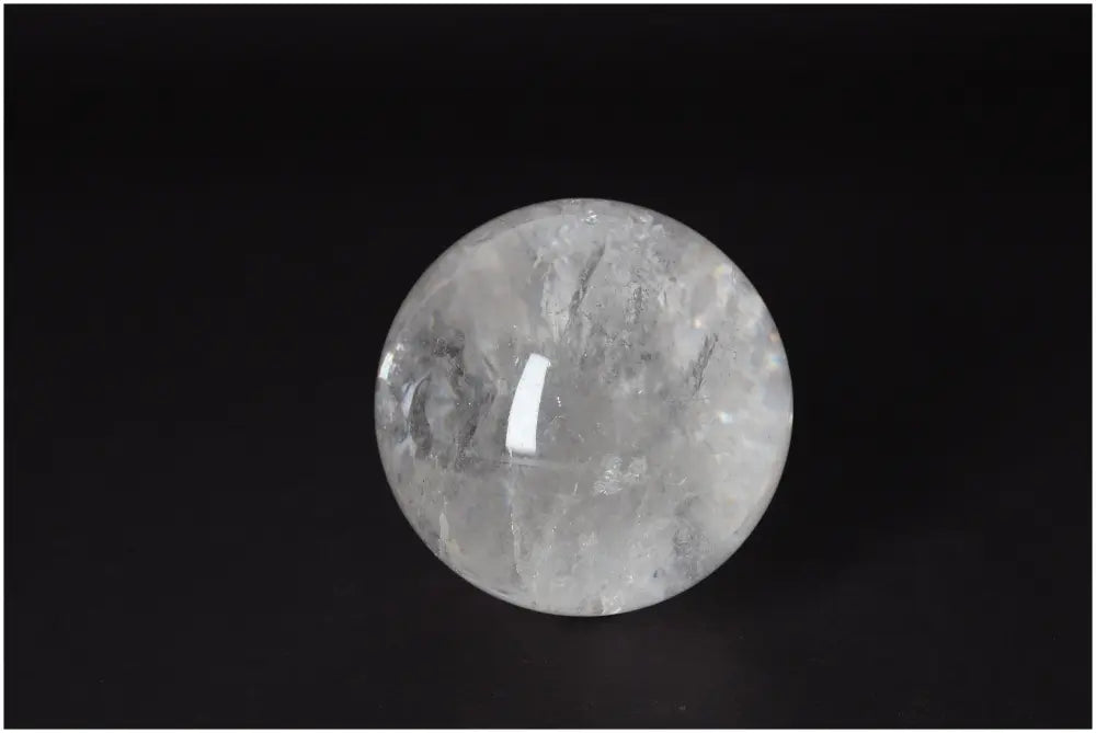Lemurian Quartz Sphere 8-9 CM showcasing radiant energy and luminous clarity, ideal for spiritual growth and intuition enhancement.
