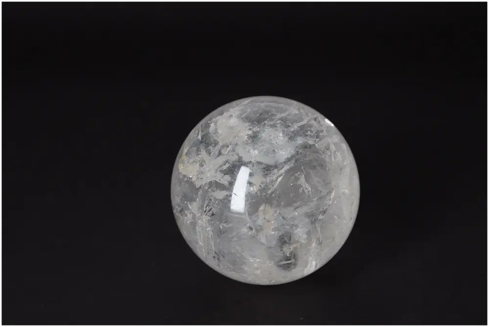 Lemurian Quartz Sphere 8-9 CM with radiant energy and luminous clarity, promoting intuition and spiritual growth.