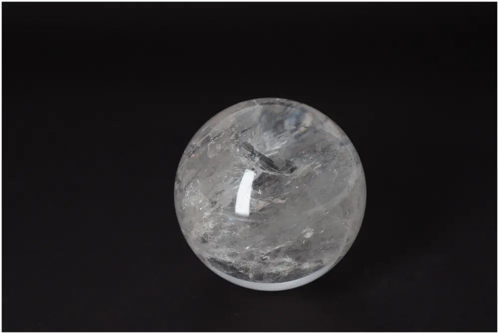 Lemurian Quartz Sphere 8-9 CM with radiant energy and soul connection, featuring luminous clarity and subtle striations.