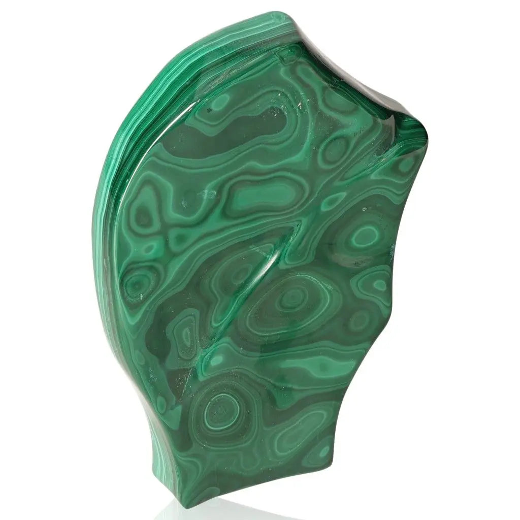 Polished green Malachite gemstone displaying unique swirling patterns, revered for courage and hope, aids in life's transitions.