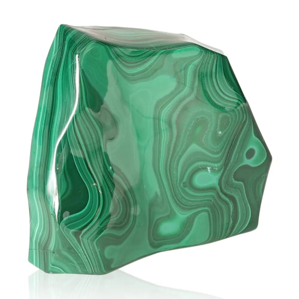 Malachite gemstone with rich green swirling patterns, known for empowerment and positivity, offering aesthetic beauty and healing energy.