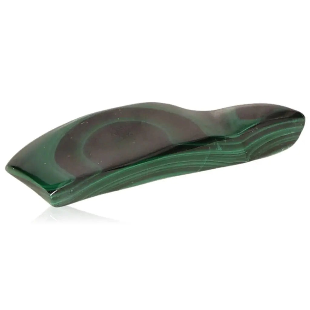 Polished malachite stone shaped into a smooth and curved form, showcasing natural green patterns and promoting soothing energy.