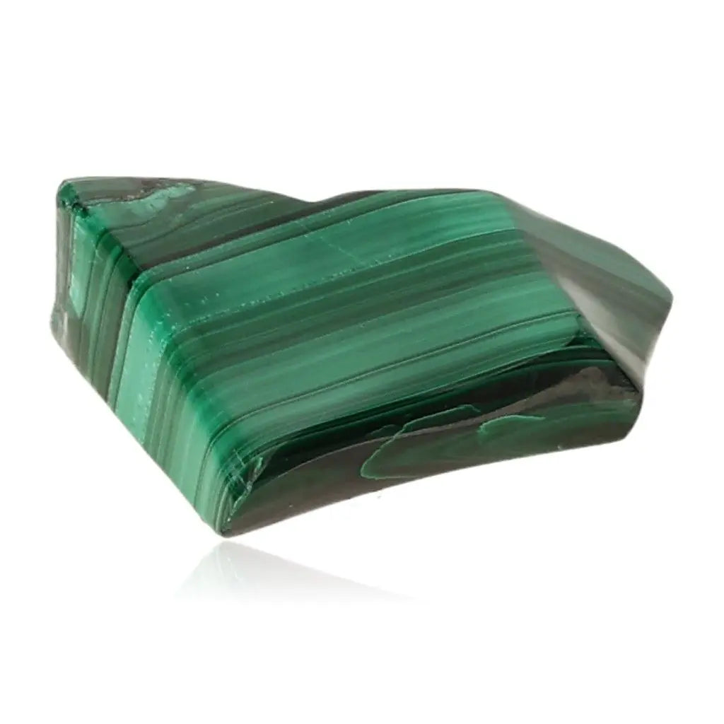 Polished malachite gemstone with green bands, embodying soothing energy and nature's tranquility.