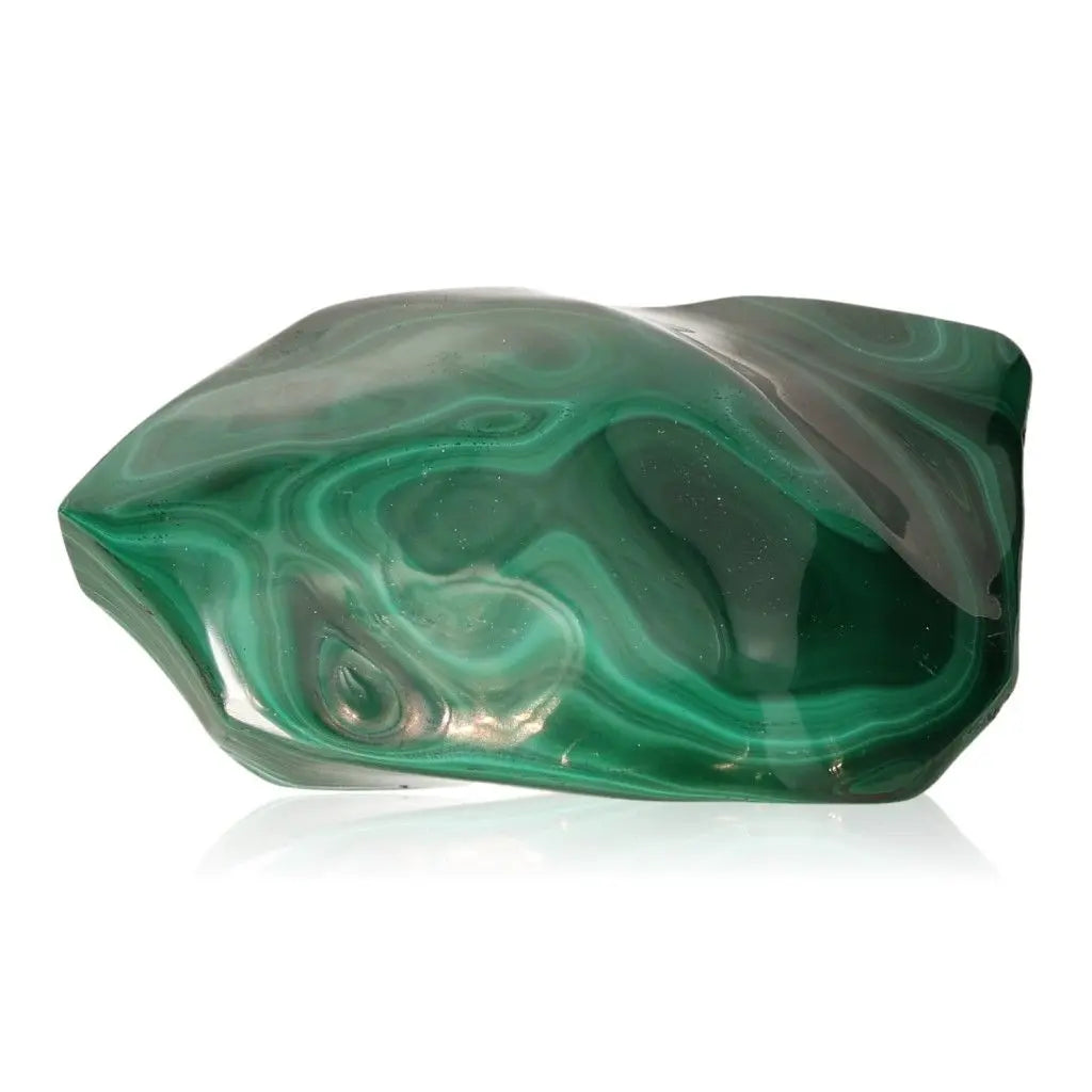 Smooth green Malachite gemstone, known as the 'Stone of Nature,' with soothing energy for courage and tranquility.