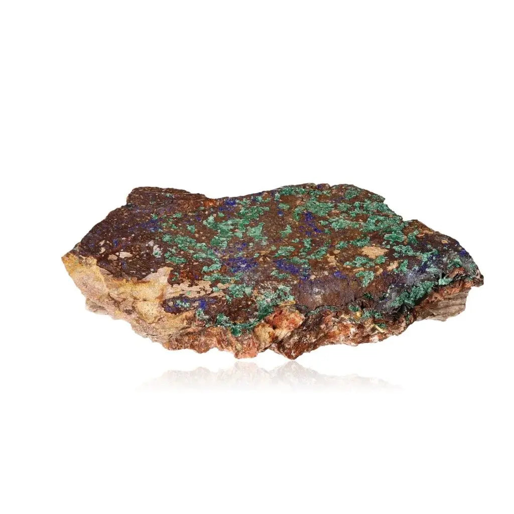 Rough malachite stone showcasing vibrant green and earthy brown patterns, symbolizing nature's serenity and strength.