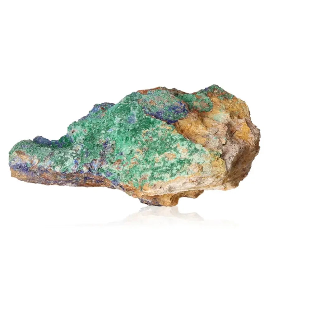 Vibrant green Malachite stone with natural swirls and bands, known for its energizing and calming properties, on a white background.