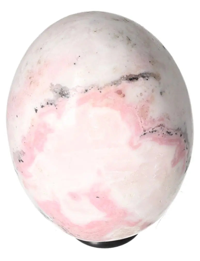 Manganocalcite egg crystal known for healing, clearing negative energy, boosting creativity and promoting peace and calm.