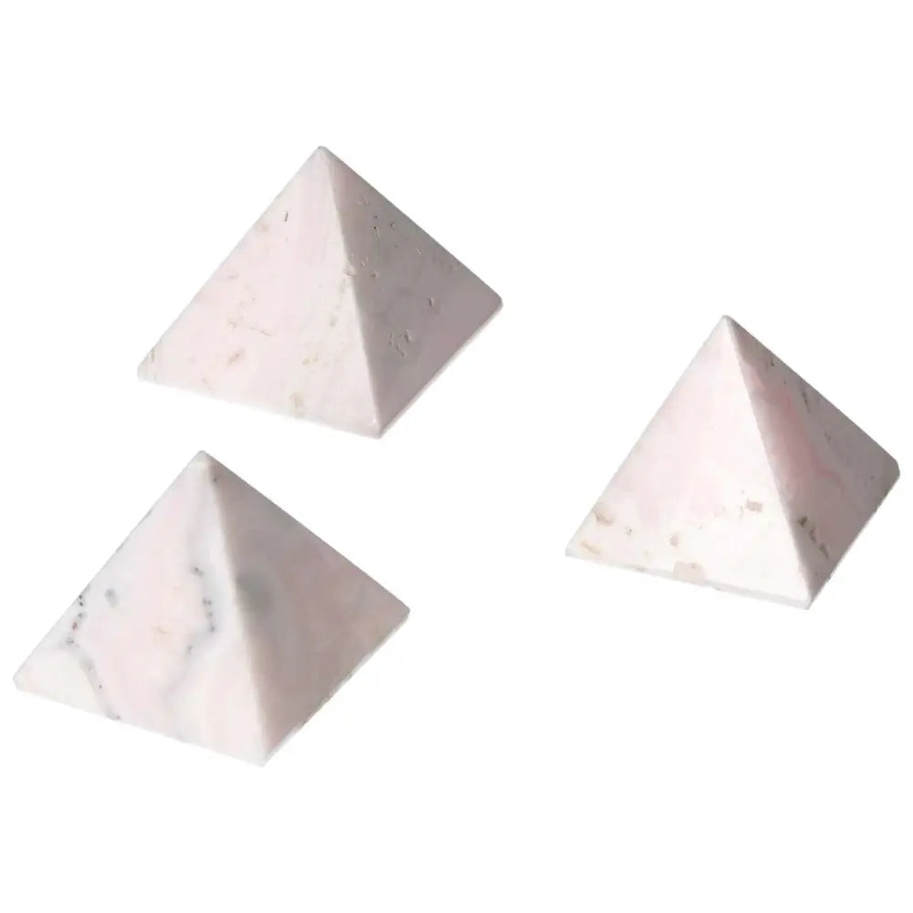 Set of three Manganocalcite pyramids for healing and creativity, promoting peace and clearing negative energy.