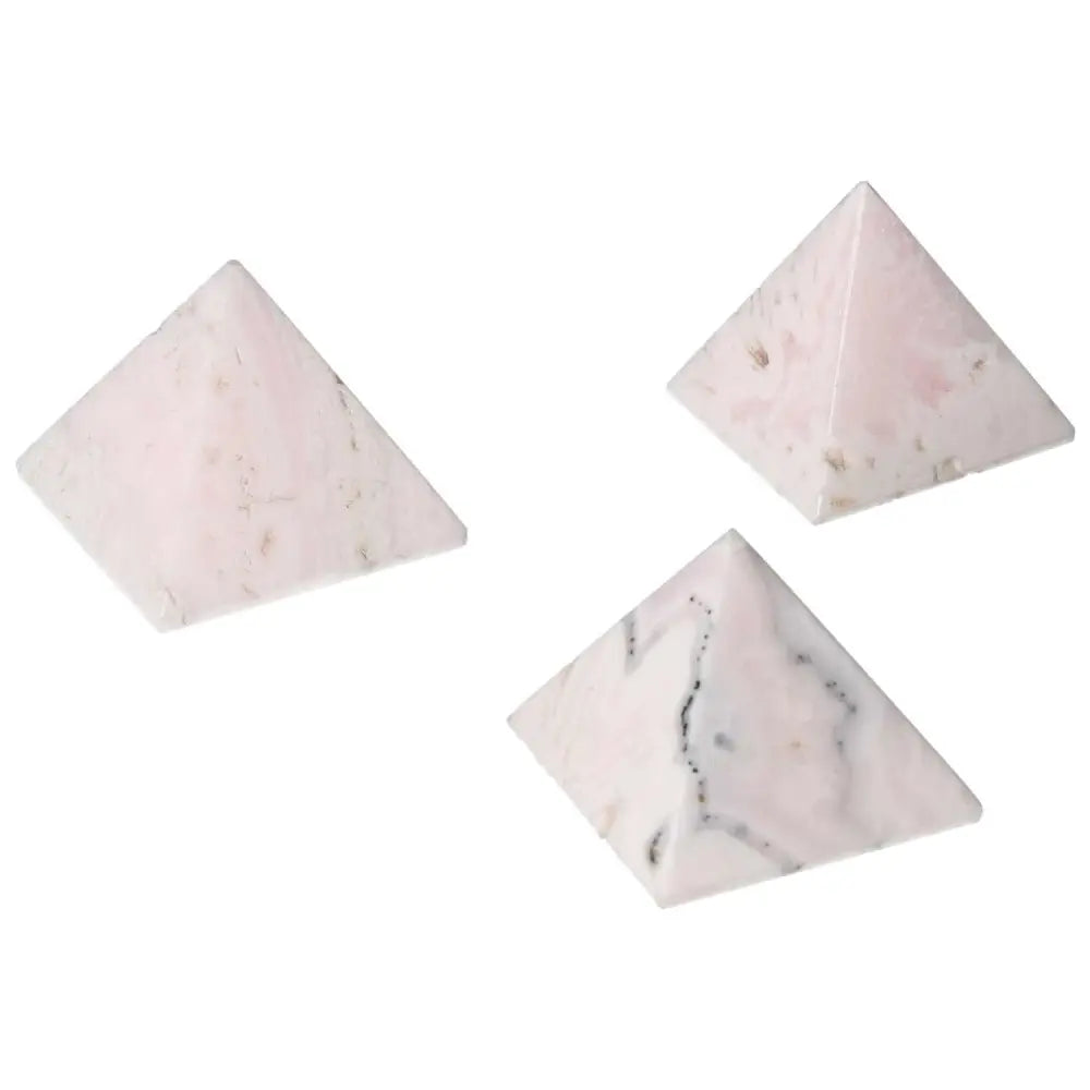 Manganocalcite pyramid crystals promoting peace, creativity, and healing; ideal for clearing negative energy and boosting productivity.