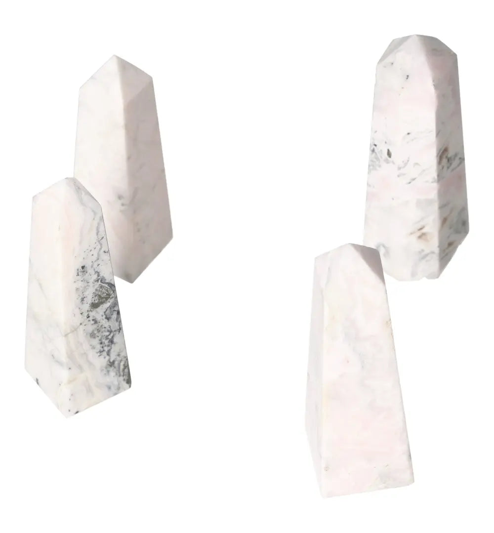 Mangano calcite towers for healing and creativity enhancement, promoting peace and clearing negative energy.
